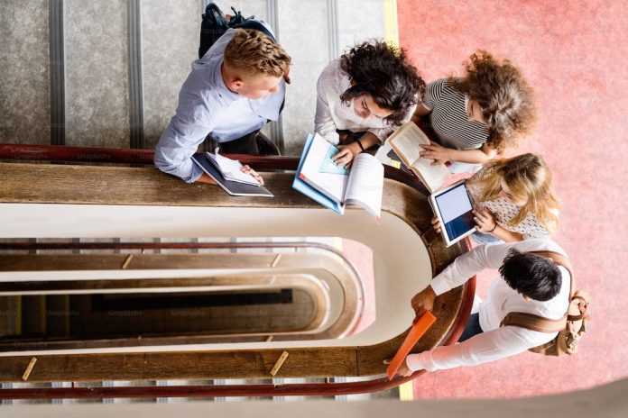 Students reading on stairs!