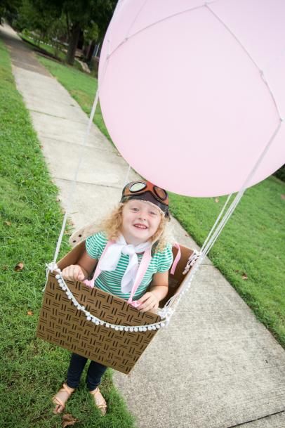 Image of a kid dressed as a hot air balloon for Halloween