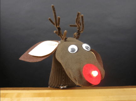 An image of a puppet reindeer made of sock 