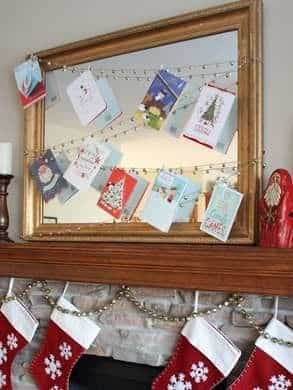 An image of Christmas cards decorated on a mirror 