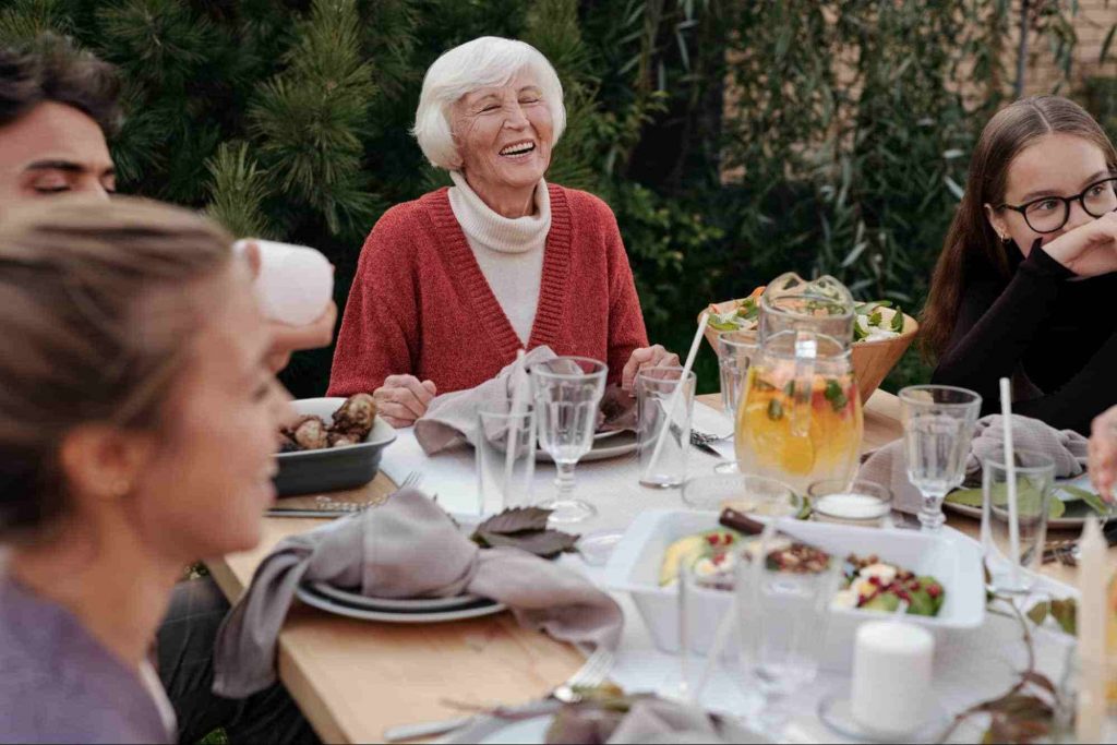 An image of a family laughing together on best kids jokes