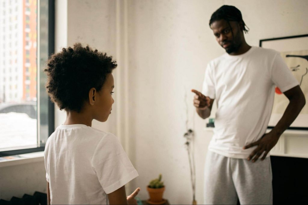 Parentscoldingchild An image of a father scolding his child