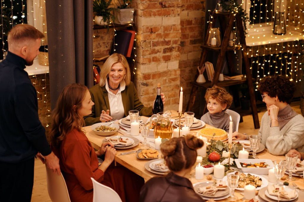 Family telling jokes on Christmas dinner