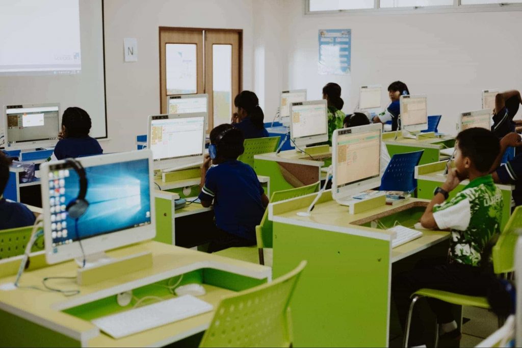 Image of kids in computer class 