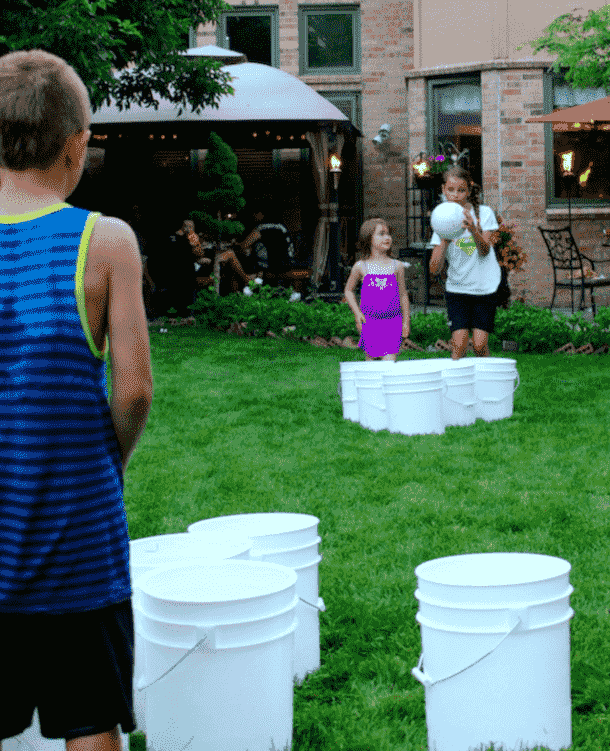 Image of kids playing "splat bucket" - a fun outdoor game for kids 