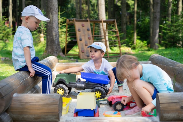 Smallboysplayingoutsideingardencompassionatevsempathetic Small boys playing outside in garden compassionate vs empathetic