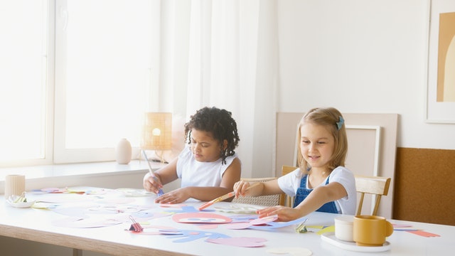 Two young girls drawing Social Emotional Learning Activities