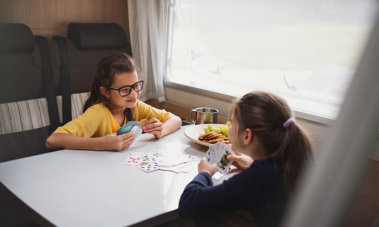 Image of kids enjoying a card game - math activities for preschoolers 