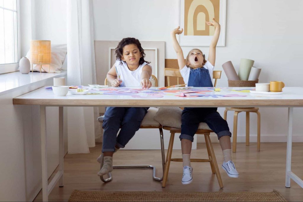 kidsyawning | SplashLearn Image of kids sitting in class & yawning