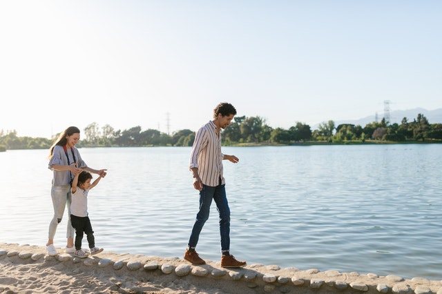 parents taking their child for a walking co parenting parents taking their child for a walking co parenting