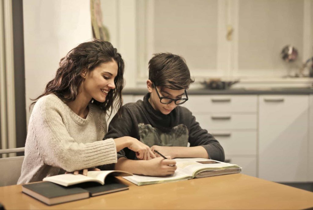 Image of a teacher and student studying