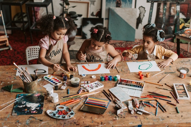 Three young girls drawing Social Emotional Learning Activities