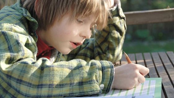 Image of a kid with dysgraphia