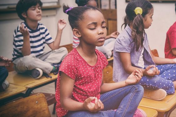 Children meditating in a group Growth Mindset for Kids