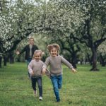 Children running on grass Spring activities for preschoolers