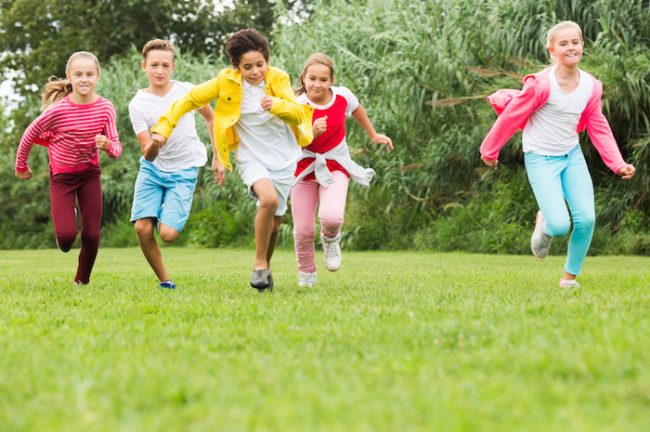 Image of kids running in the playground 