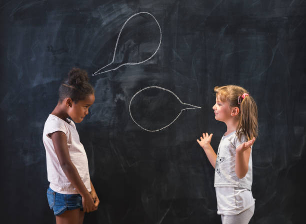 Schoolgirls having a discussion and debate topics for kids Schoolgirls having a discussion and debate topics for kids