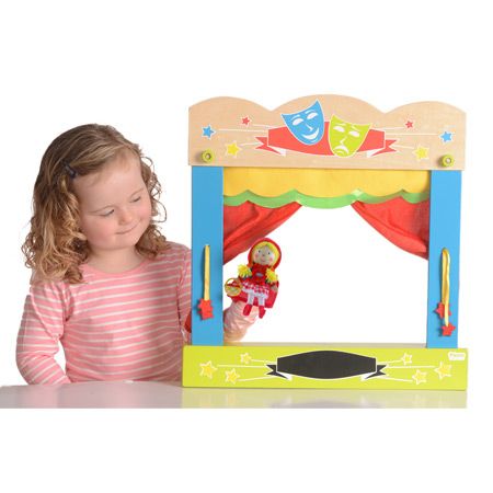 Young girl performing puppet show theater for kids