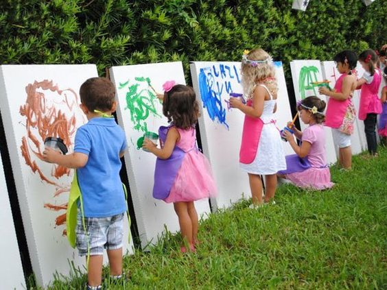 Image of kids painting in the garden