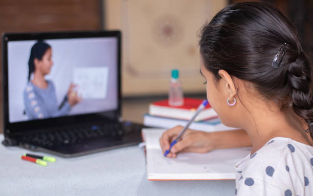 onlinestudying Image of a kid studying online