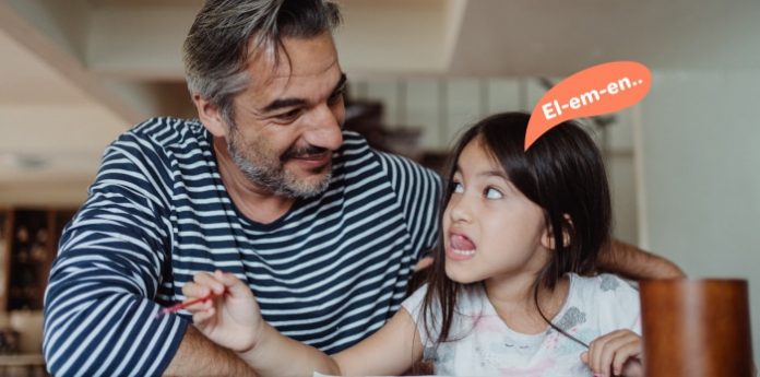 Image of a daughter and father doing speech therapy