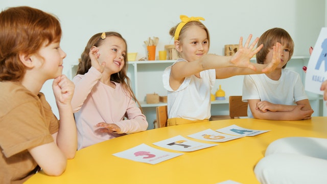 Students listening to their teacher What is taught to kids in 3rd grade