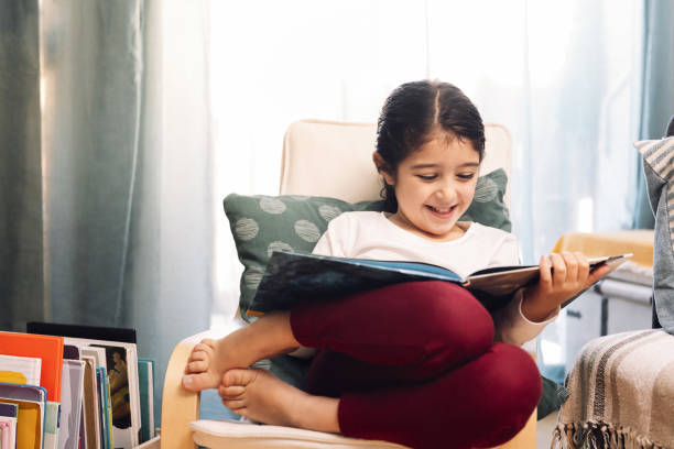 girl reading book in chair reading websites for kids girl reading book in chair reading websites for kids