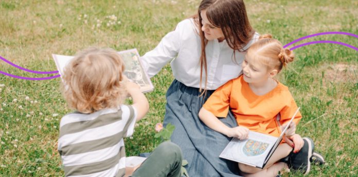 Mommy and Daughter and Son is reading books In the Garden