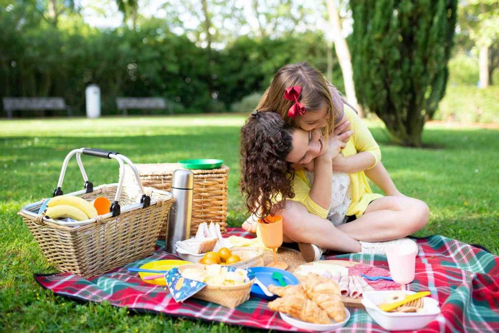 Mother and daughter at picnic