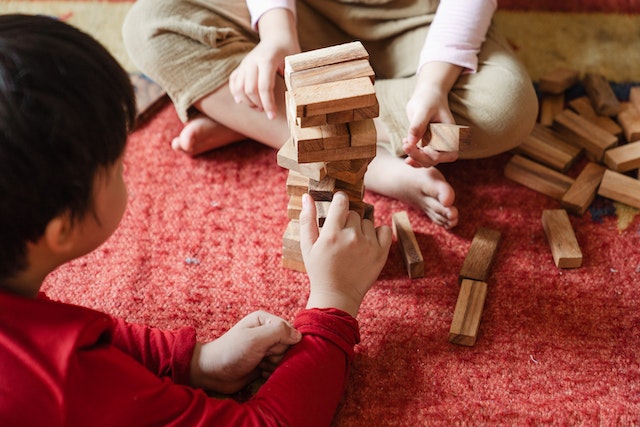 Children playing a game of Jenga