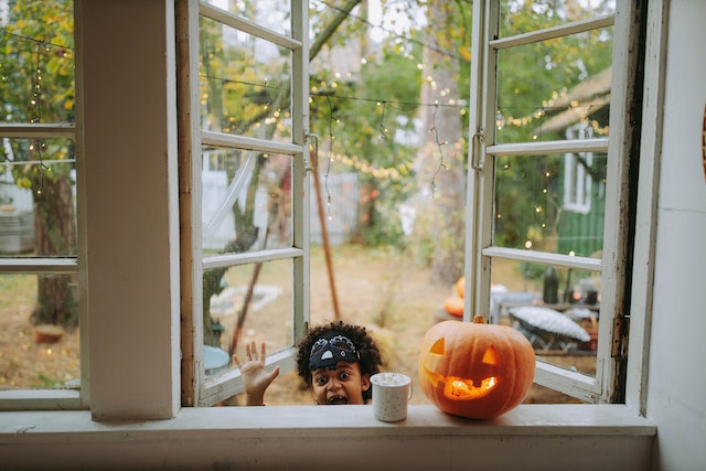 amazingathomehalloweendiycraftsforkids Child getting ready for Halloween festivities