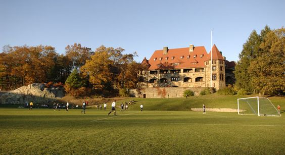 Kids playing football in the soccer field of Noble and Greenough School