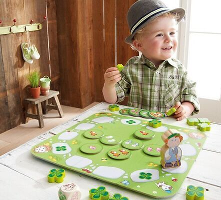 Young boy playing board game