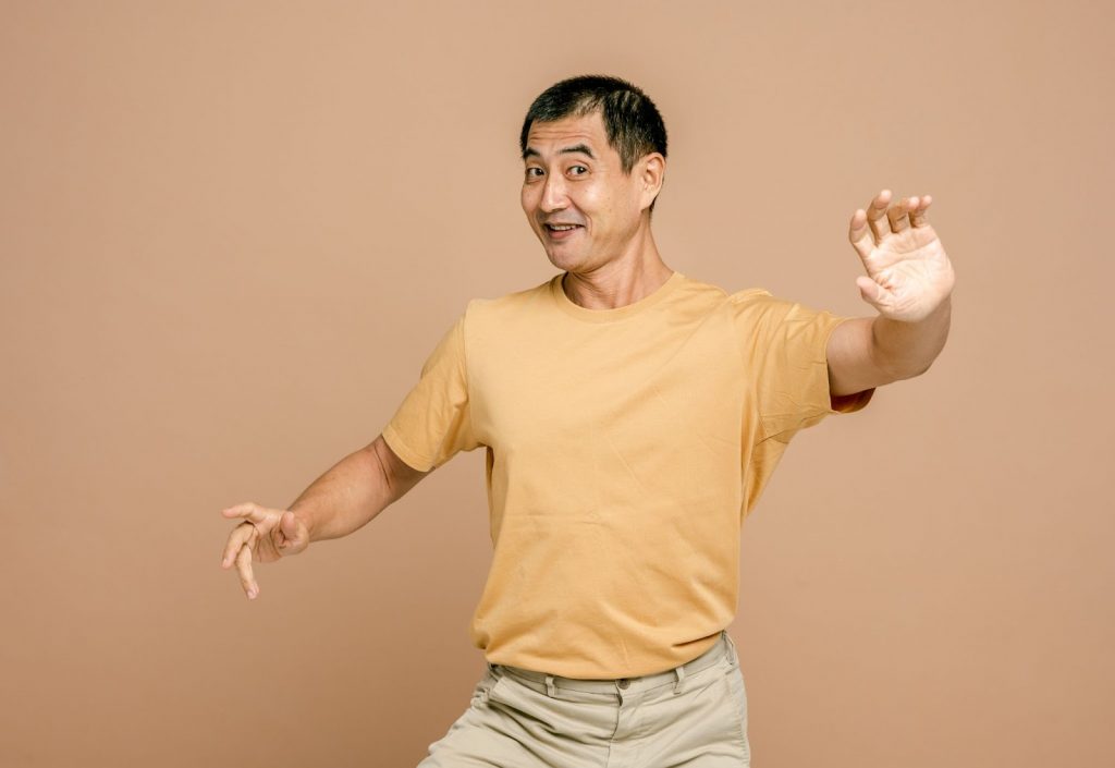 A man in a goofy pose