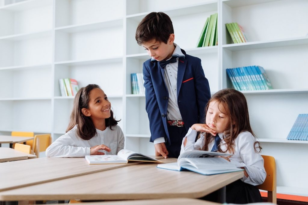 Kids studying in a library