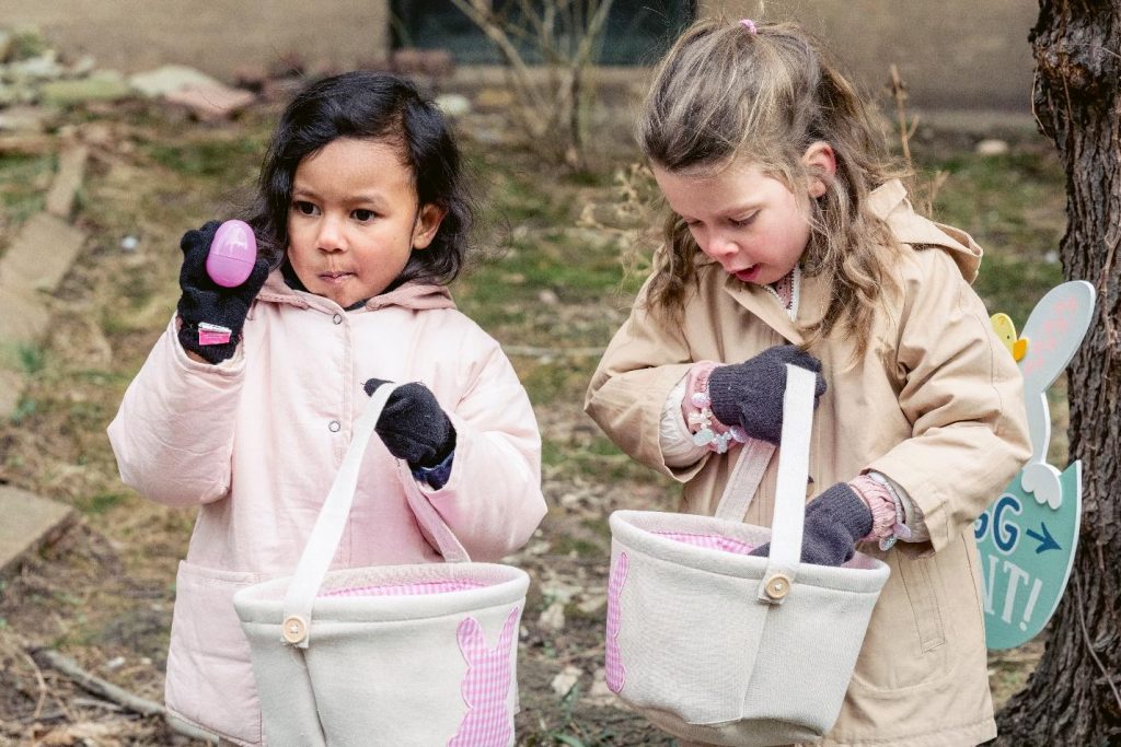 Little girls hunting for Easter eggs