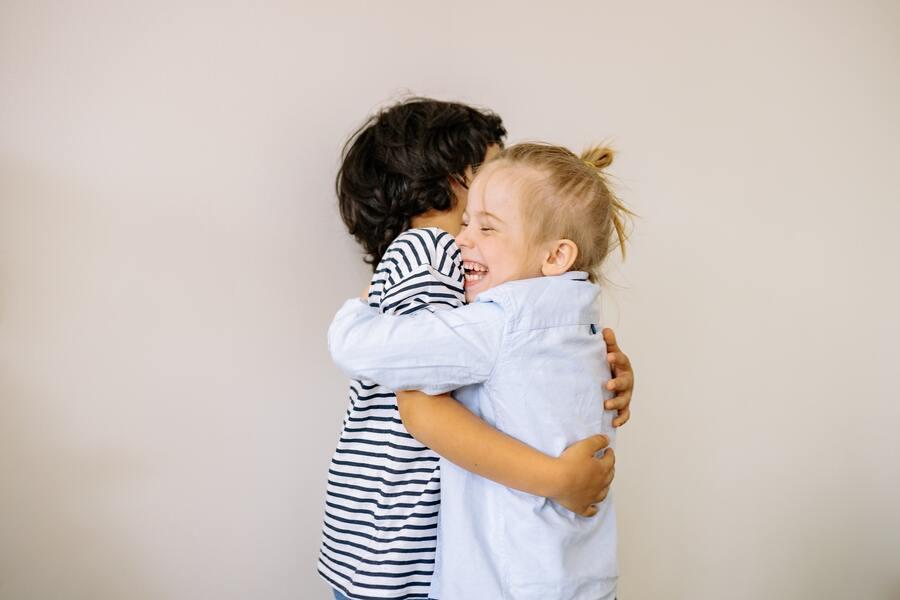 Kids hugging each other