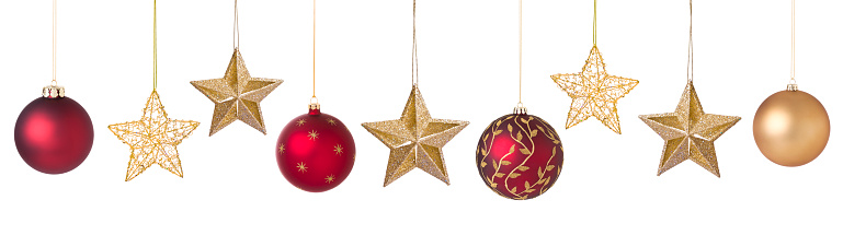 Christmas baubles in red and gold isolated on white