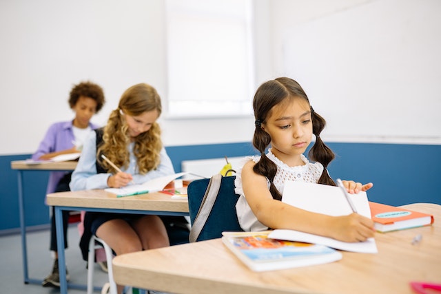 Kids working on math problems