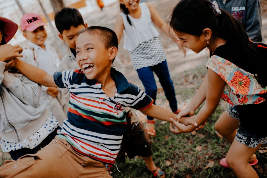 Kids playing tag outdoors