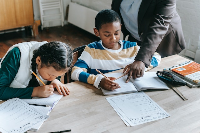 Kids doing math classwork