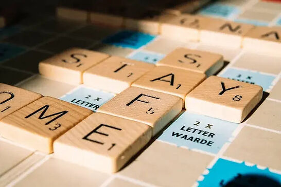 Letter tiles on a board game