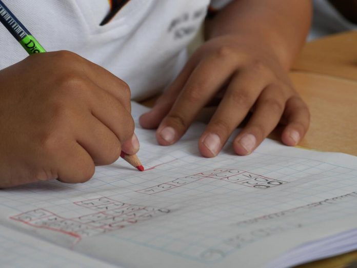 maths number project A child doing math problems