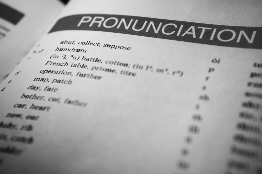 Shallow depth of field closeup of the word pronunciation on a book page