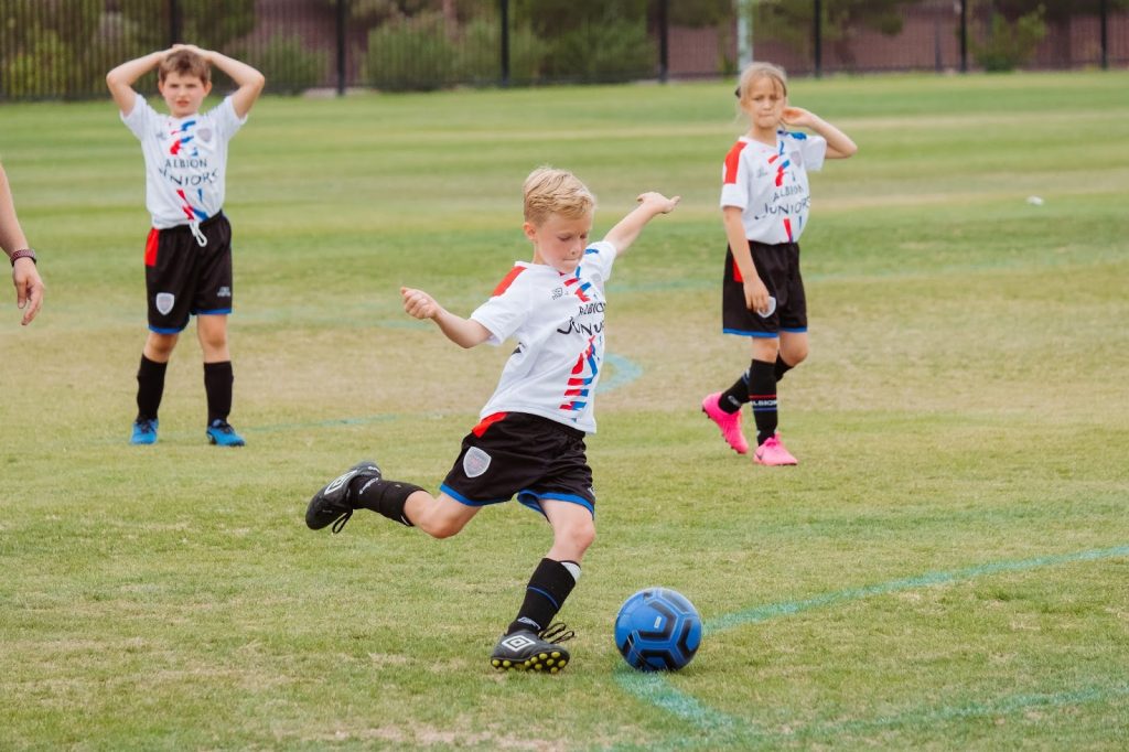 Kids playing football