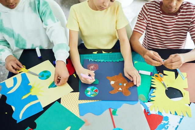 Children participating in crafts projects