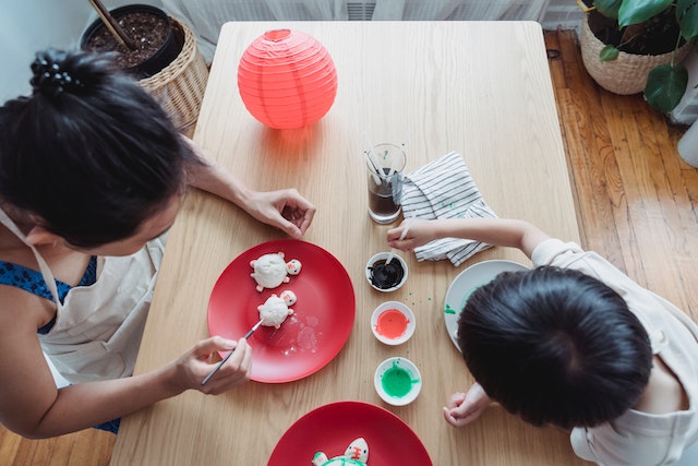 Mother and child making Mothers Day crafts