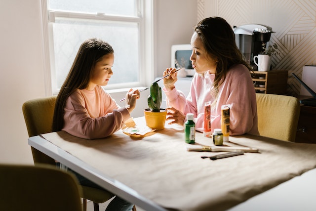 Mother and child bonding over craft project