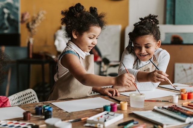 Kids participating in indoor spring activities