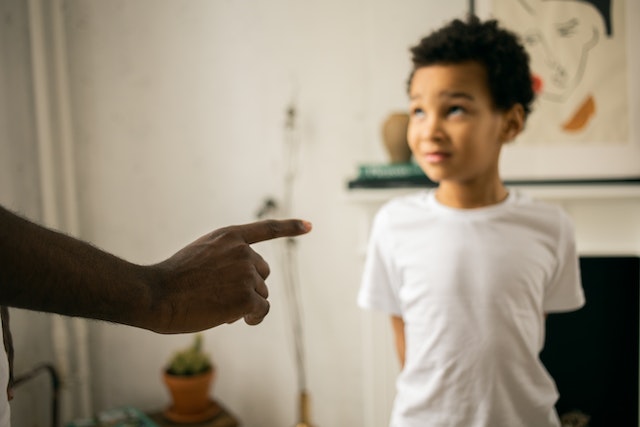 Parent disciplining their child
